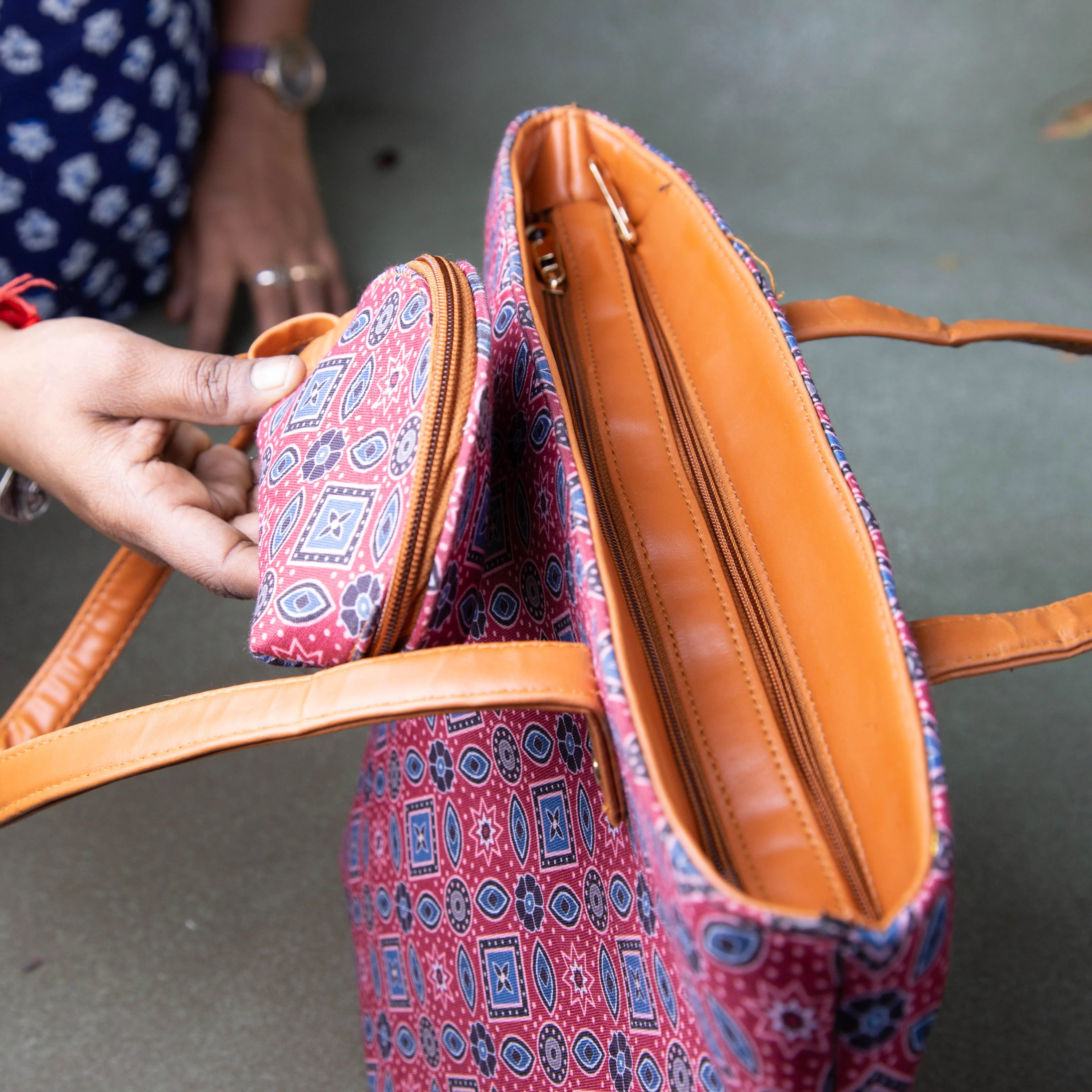 Double Zippered Tote Red Colour with Blue Diamond Design.