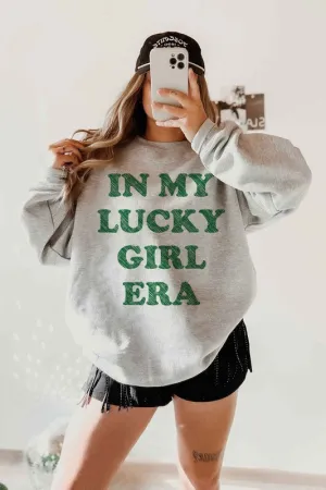 IN MY LUCKY GIRL ERA PATRICK GRAPHIC SWEATSHIRT